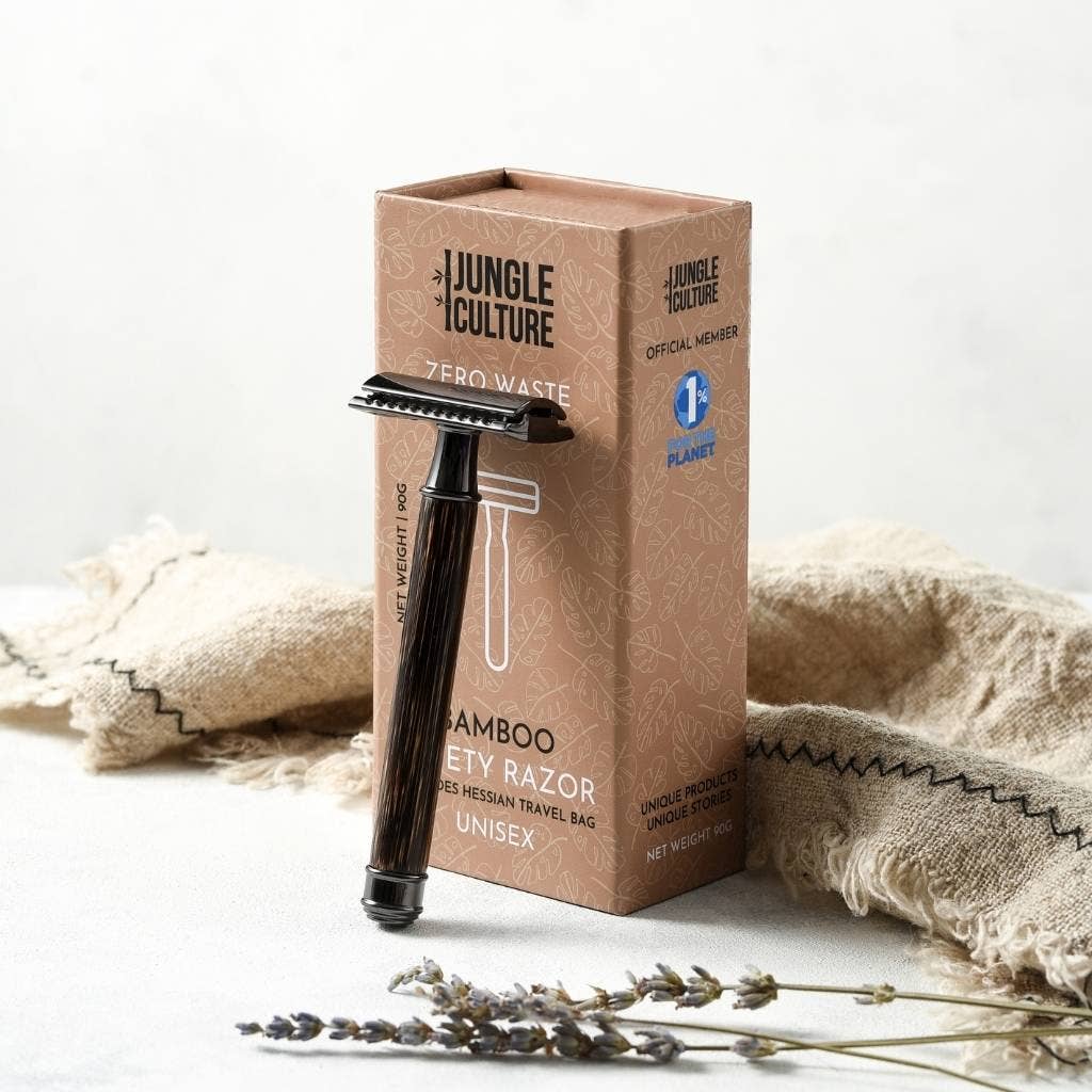 Jungle Culture plastic-free bamboo safety razor with packaging on a neutral background.