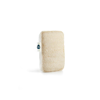 Beige rectangular SEEP  plastic-free dishwash sponge with a brand label on a white background