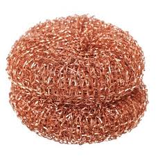 A copper-colored stainless steel wire mesh scrubber sponge, shown as a stack of two overlapping round coils on a plain white background.