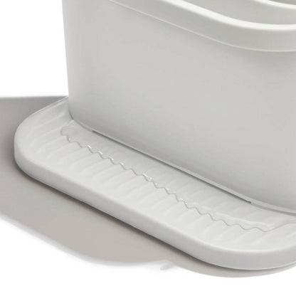 White recycled rubber mat with textured edge on a white background