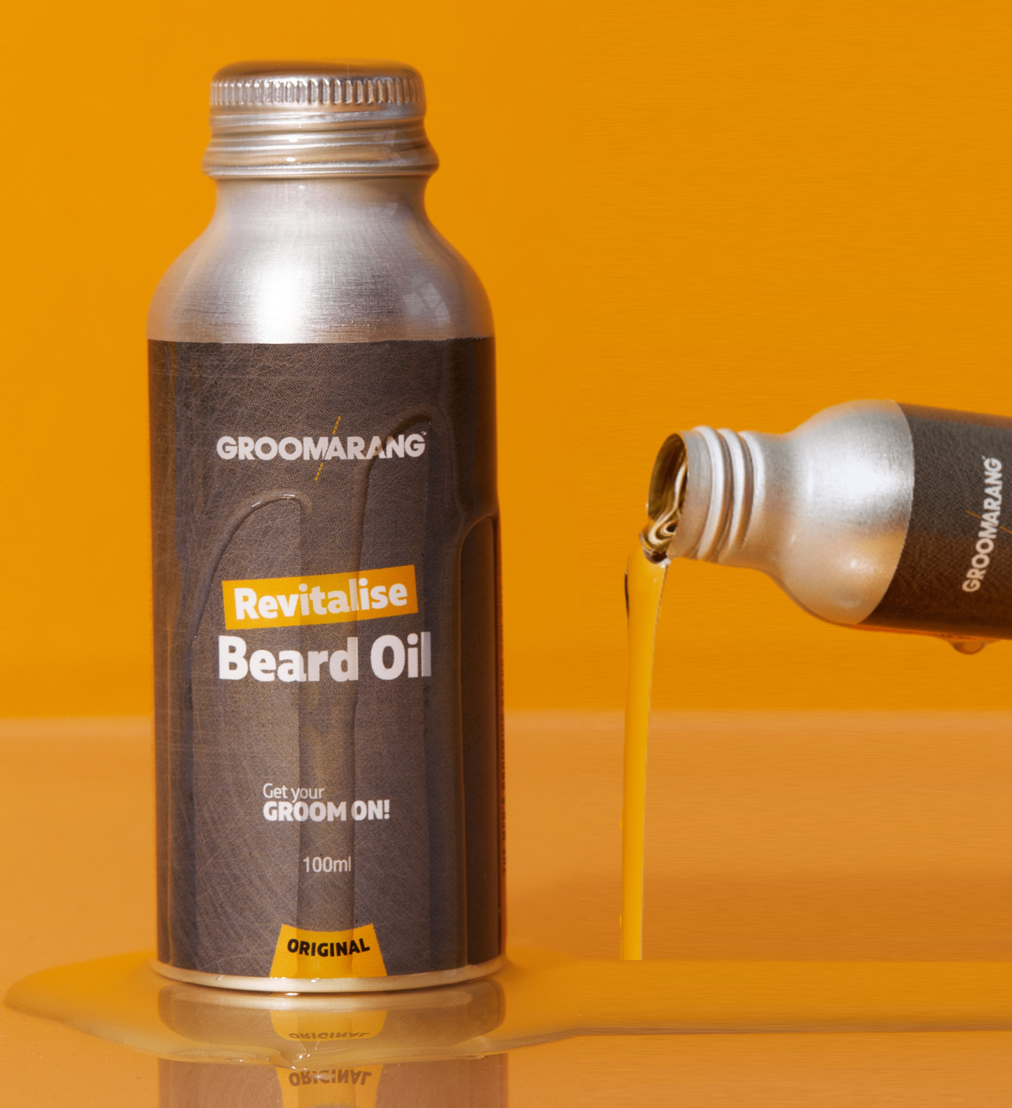1 bottle of metail beard oil with label and 1 bottle of oil flowing out of it