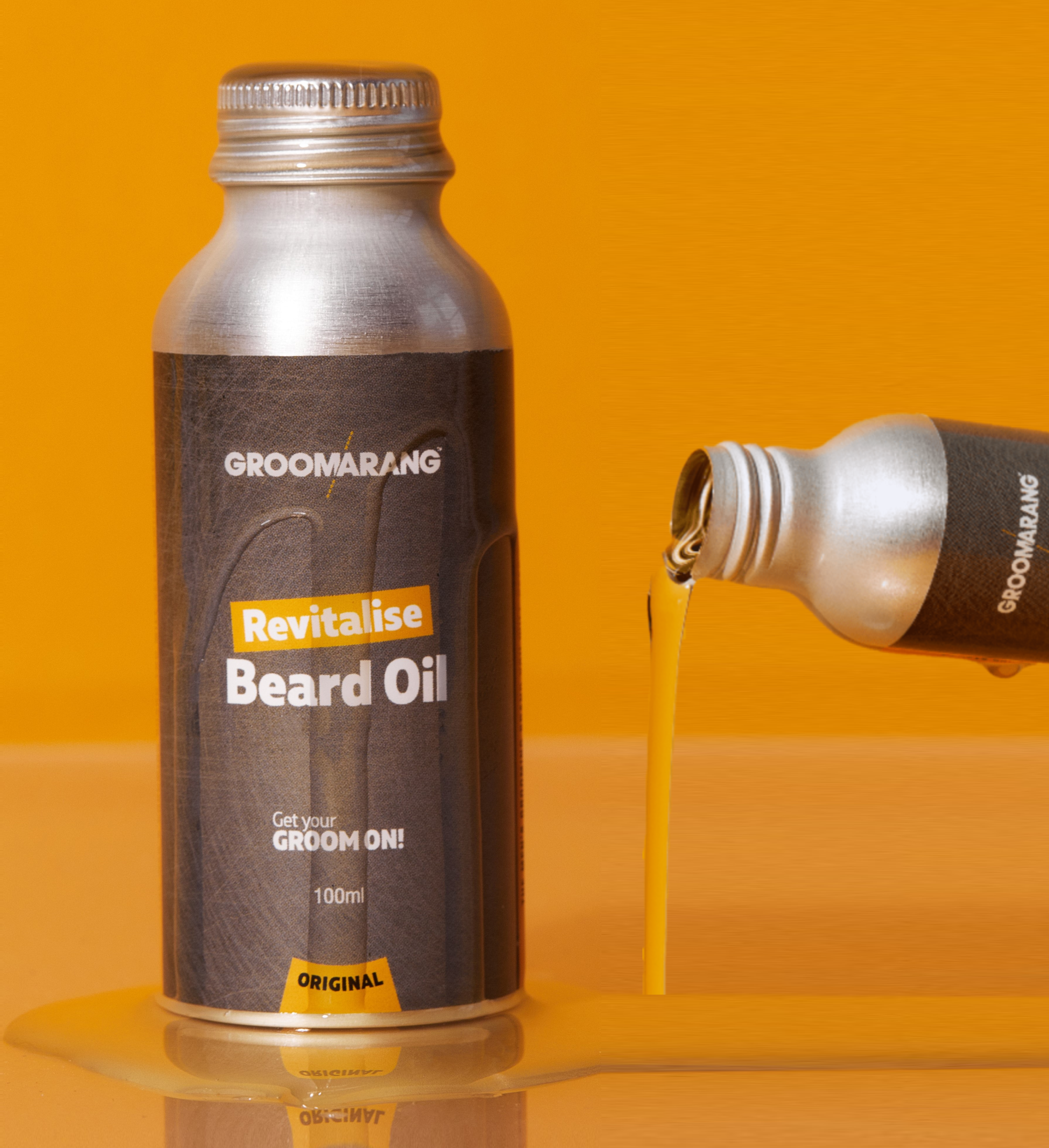 1 bottle of metail beard oil with label and 1 bottle of oil flowing out of it