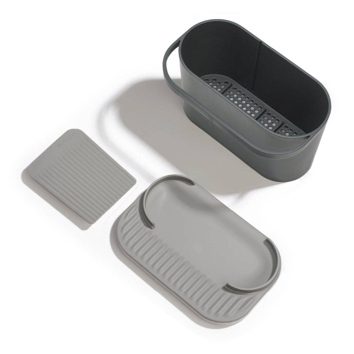 Set of grey recycled storage containers with lids on a white background